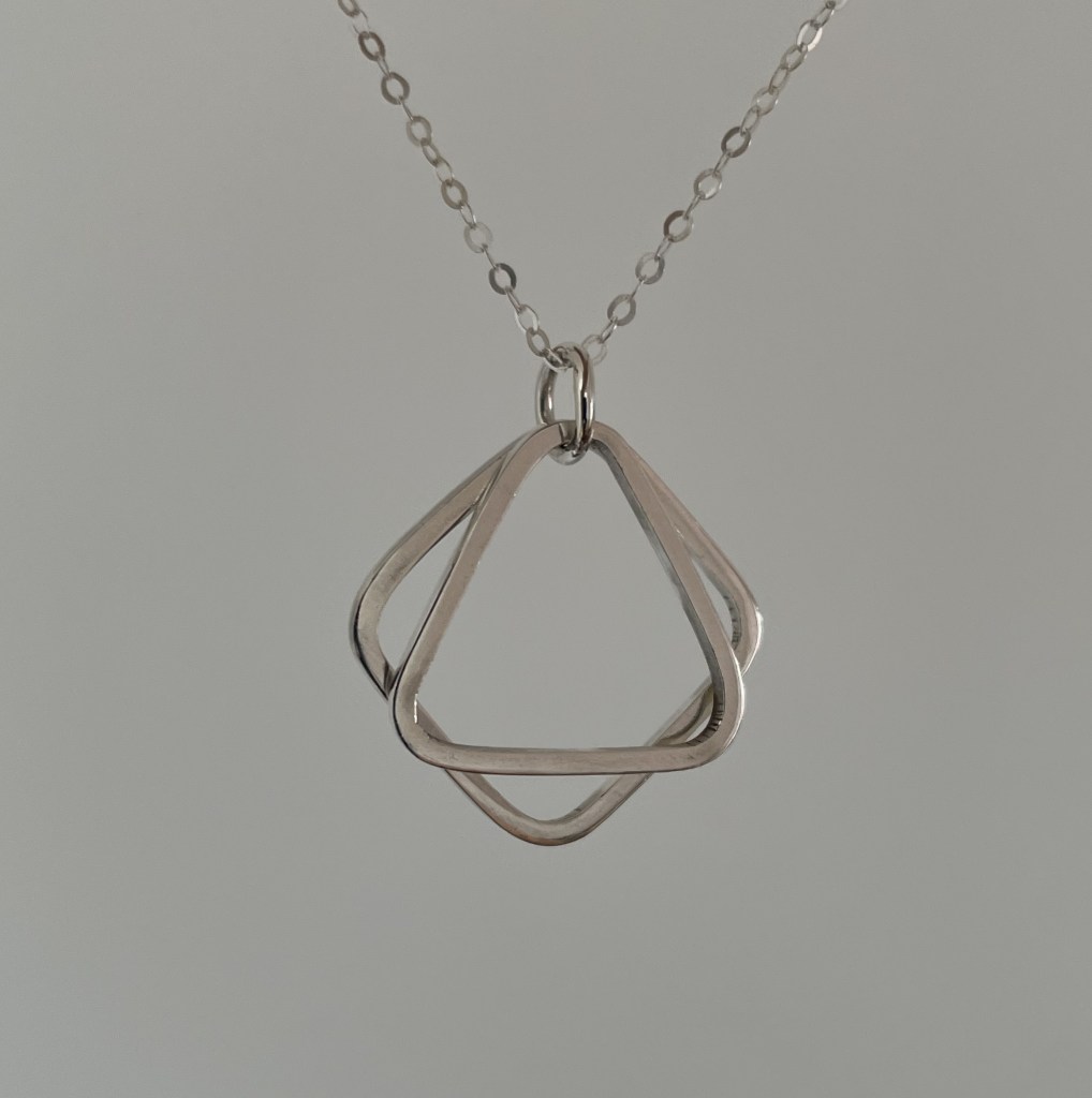 Pendant made up of two shapes using square silver wire.