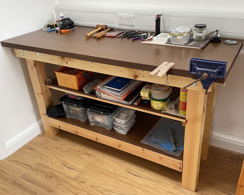 Self-built workbench mainly for use for fused glass work and silversmithing. Top is MDF.