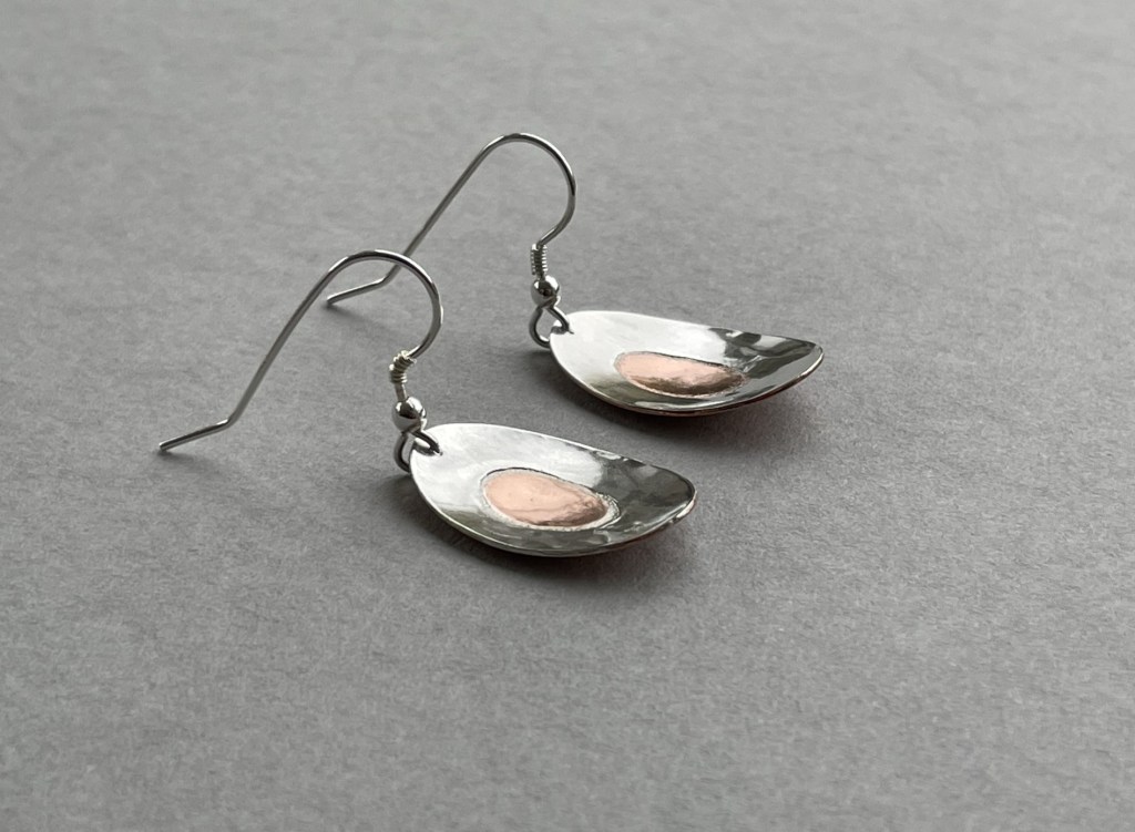 Mixed metal laminated inlay earrings using sterling silver and copper