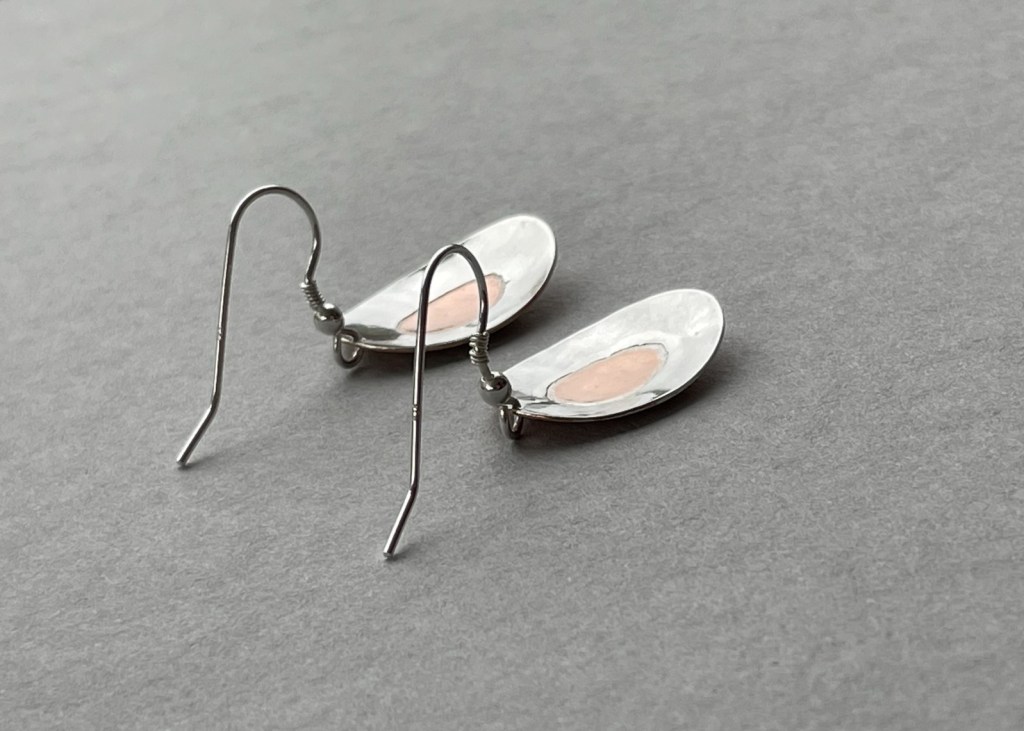 Mixed metal laminated inlay earrings using sterling silver and copper