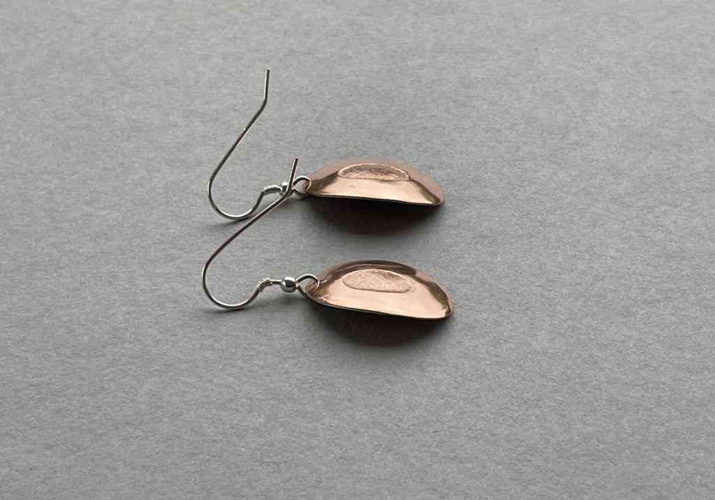 Mixed metal laminated inlay earrings using sterling silver and copper