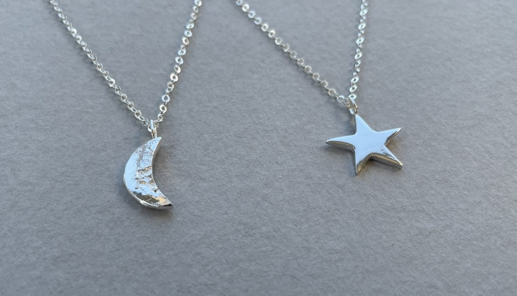 Moon and star pendants made by reusing silver. Reticulation used to texture moon.